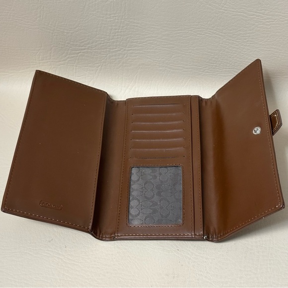 Coach Women's Brown
Signature Checkbook Wallet
Canvas & Leather Tri-Fold - Picture 3 of 6